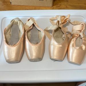 Two pairs of pointe shoes in fair condition